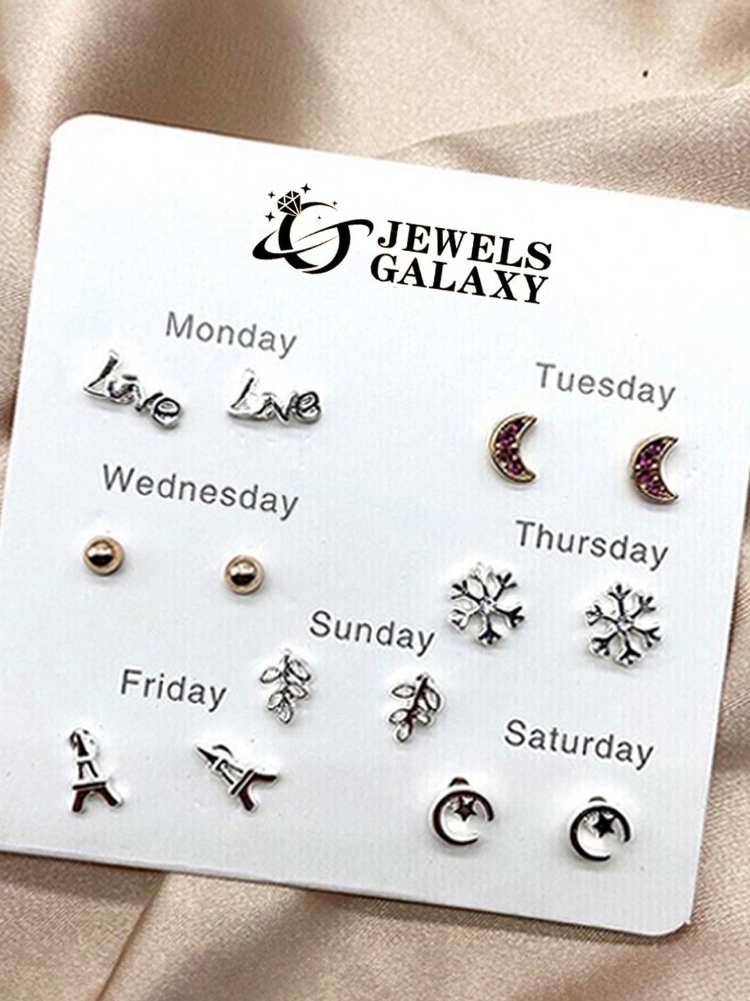 

Jewels Galaxy Set Of 7 Silver-Plated Crystals Studded Contemporary Studs Earrings