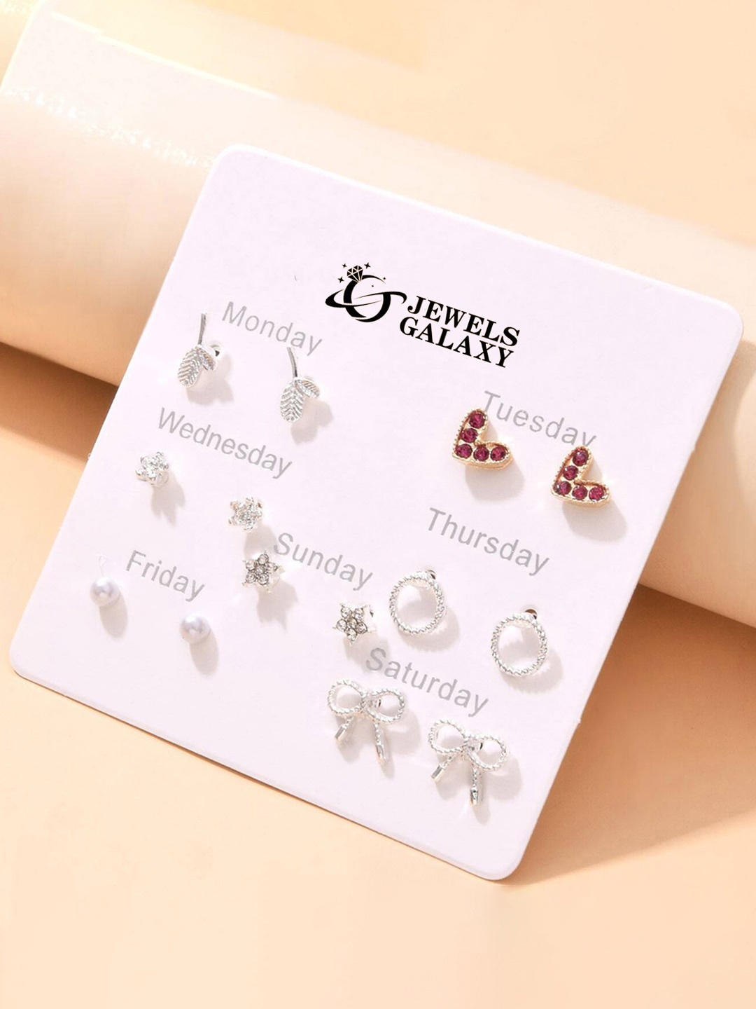 

Jewels Galaxy Set Of 7 Silver Plated Crystals Studded Contemporary Studs Earrings