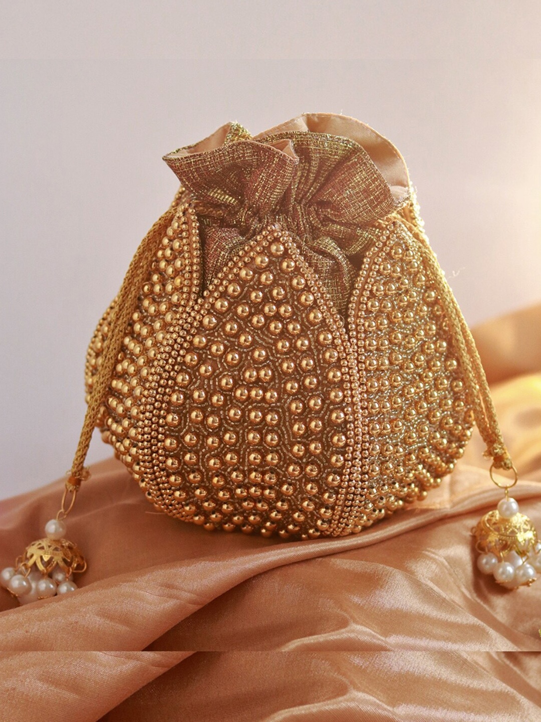 

THE TAN CLAN Embroidered Tasselled Potli Clutch, Gold