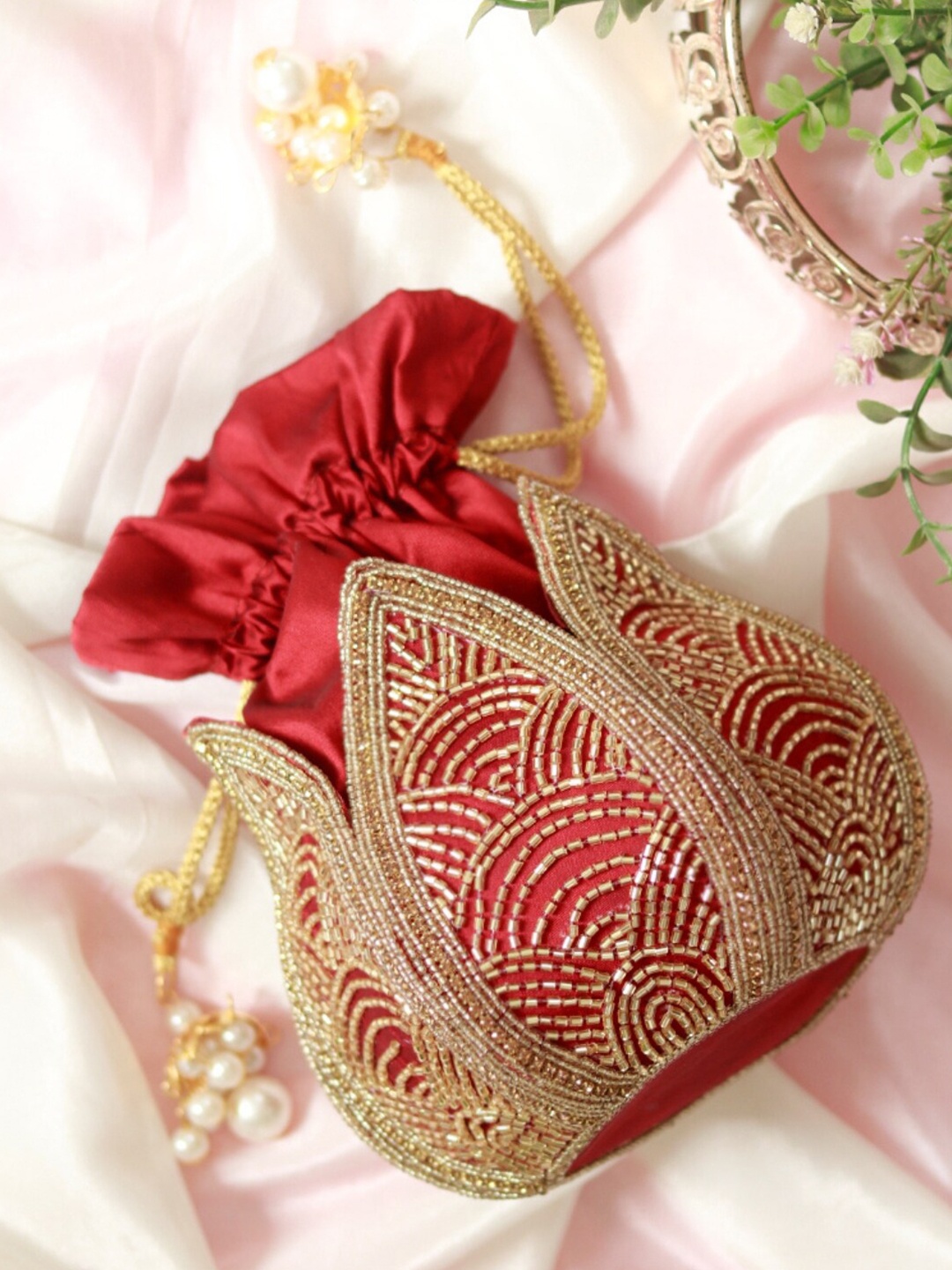 

THE TAN CLAN Embroidered Tasselled Potli Clutch, Maroon