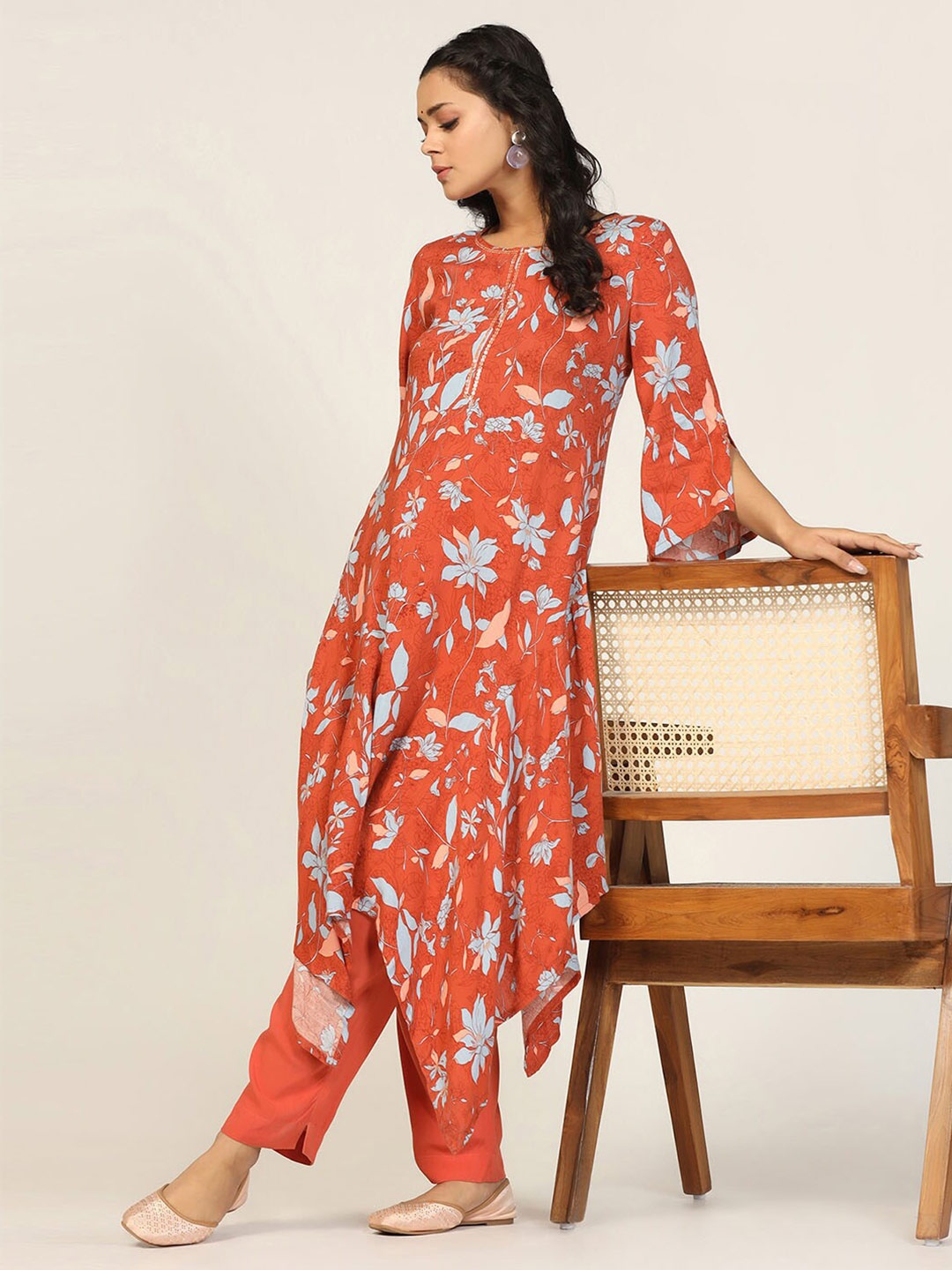 

Mustard Floral Printed Sequinned Asymmetric A Line Kurta, Orange