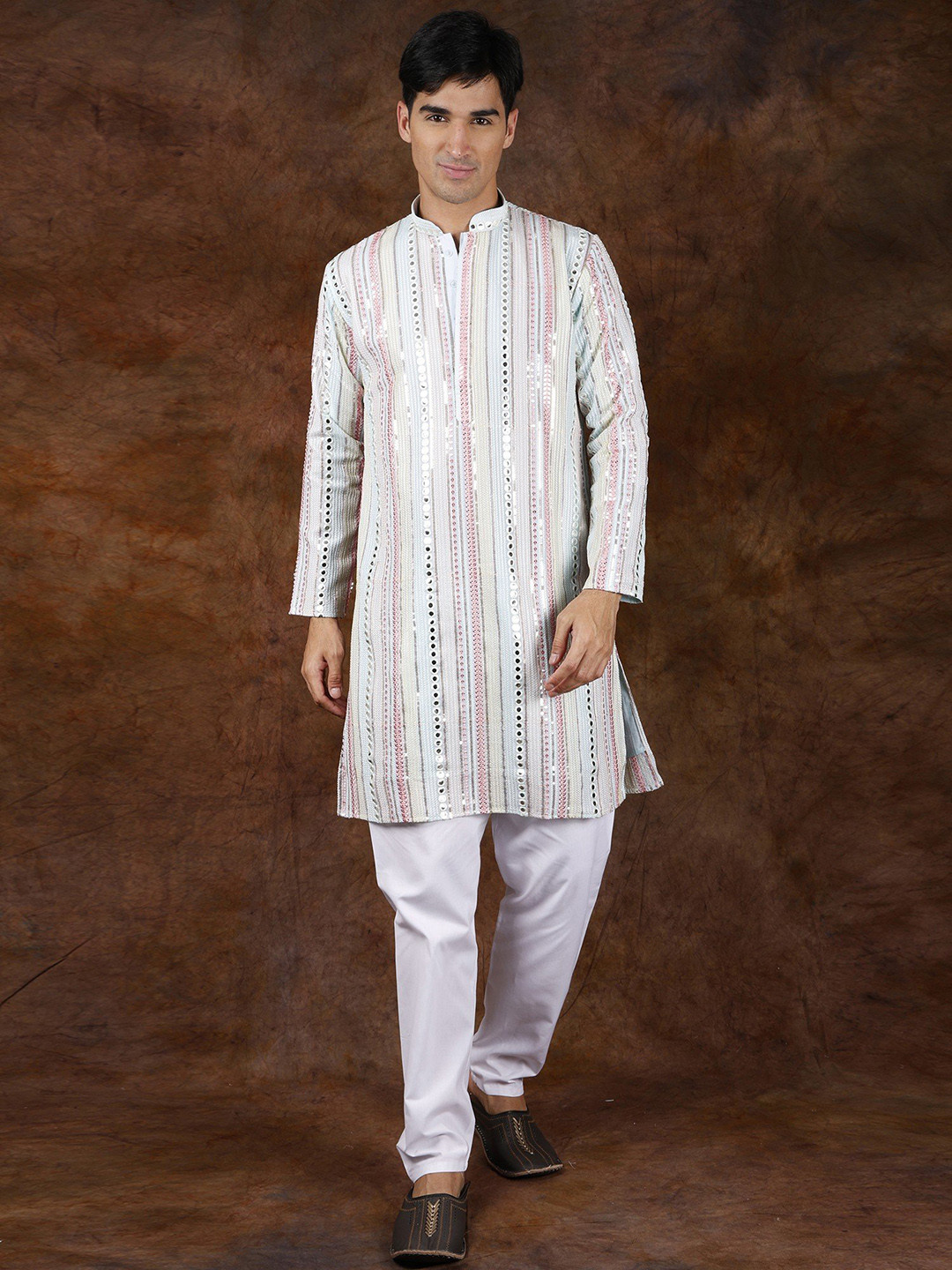 

Exotic India Saltwater Slide Designer Kurta Pajama Set with Mirrors & Embroidered Sequins, Blue