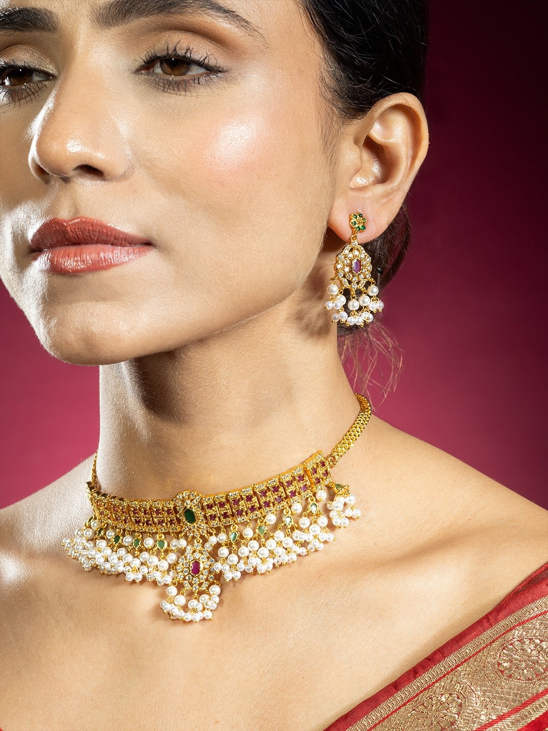

Niscka Gold-Plated Artificial Stones Studded & Pearls Beaded Necklace With Earrings