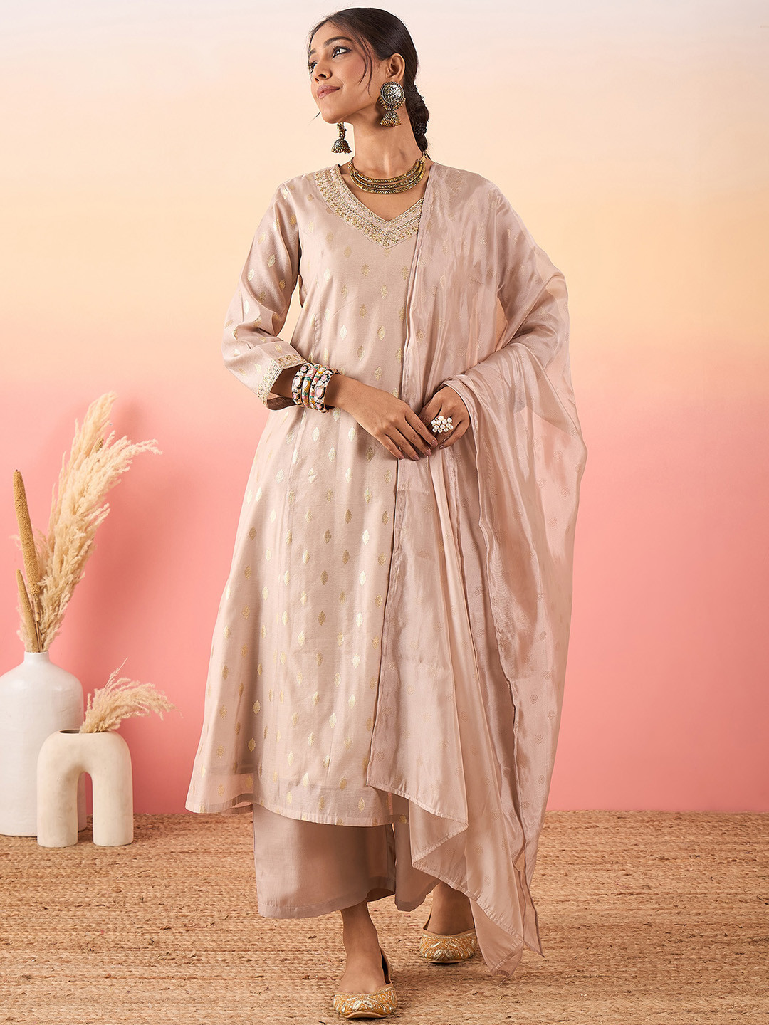 

Madhuni Ethnic Motifs Embroidered Regular Chanderi Silk Zari Anarkali Kurta Set, Beige