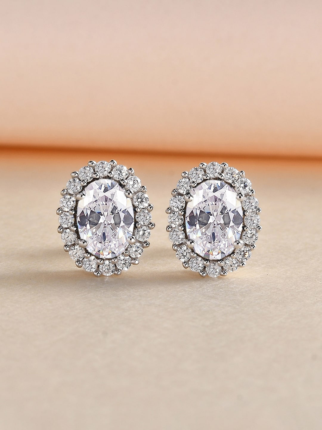 

Ornate Jewels 925 Sterling Silver Rhodium-Plated American Diamond Studded Oval Studs