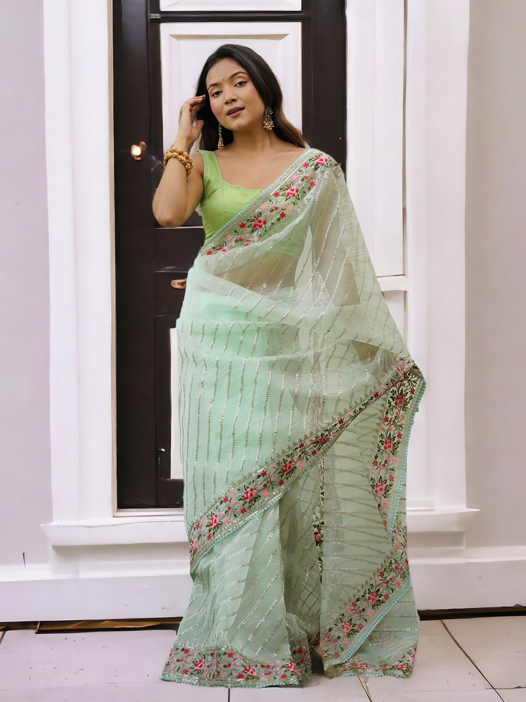 

Vastrasky Global Embellished Embroidered Organza Saree, Green