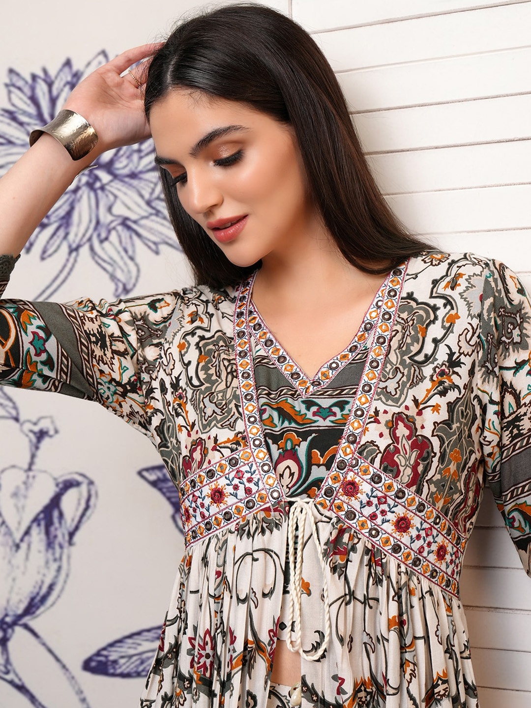 

Vishudh Grey Floral Embroidered Regular Top with Trouser