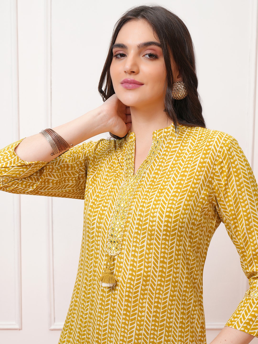 

Vishudh Mustard Yellow Geometric Printed Mandarin Collar Straight Kurta