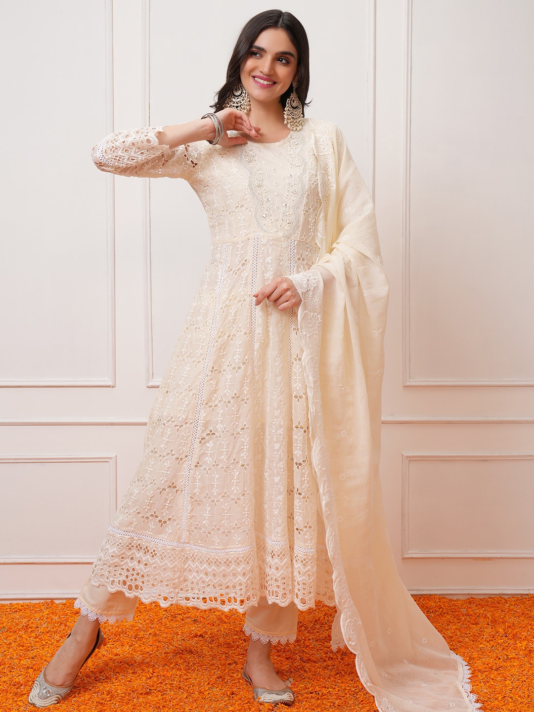 

Vishudh Cream Floral Embroidered Thread Work Cotton Kurta With Trousers & Dupatta