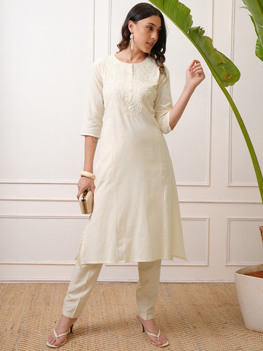 

Vishudh Off White Floral Yoke Design Thread Work Cotton A-Line Kurta