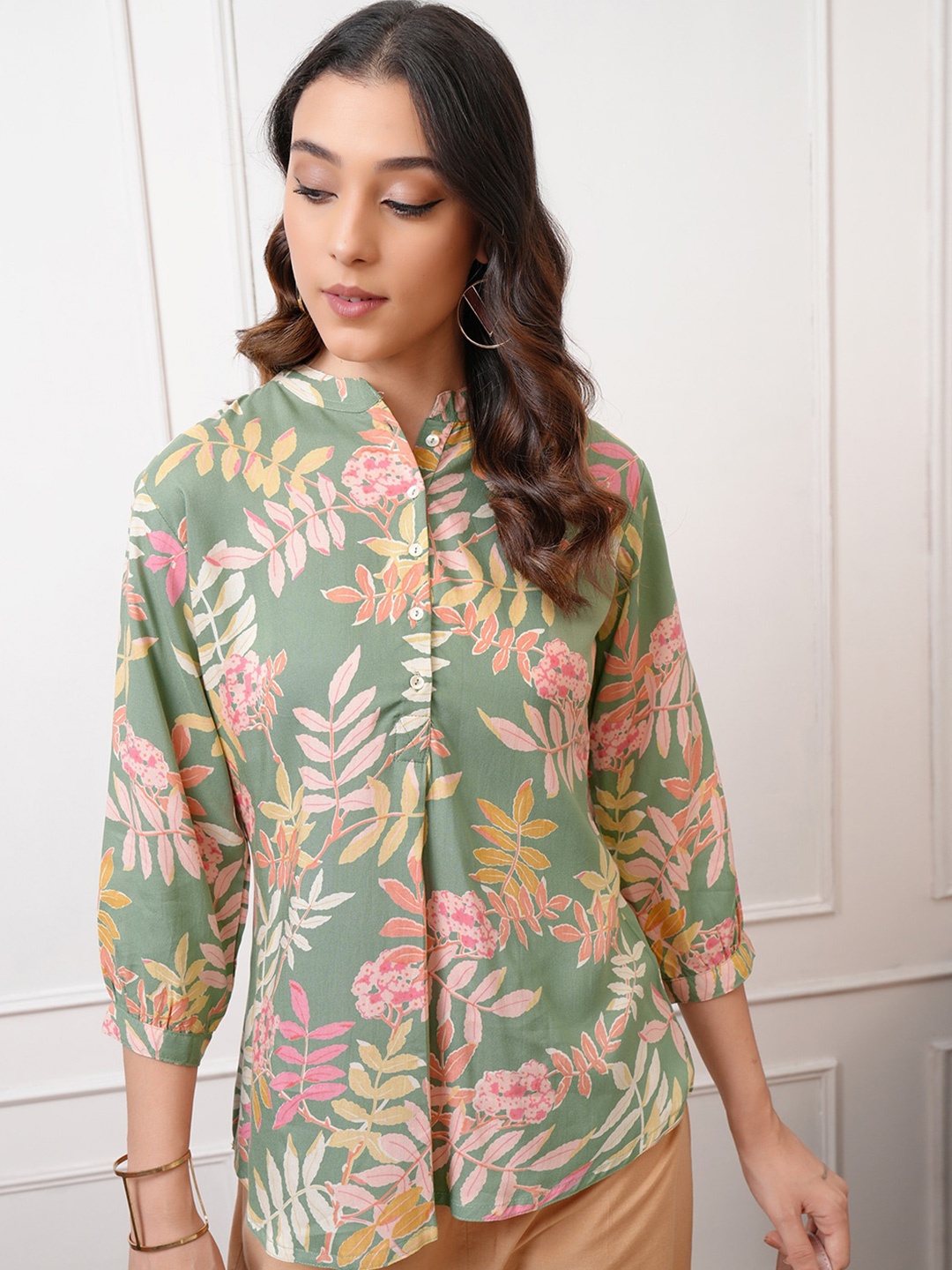 

Vishudh Green Tropical Printed Mandarin Collar Cuffed Sleeves Shirt Style Top
