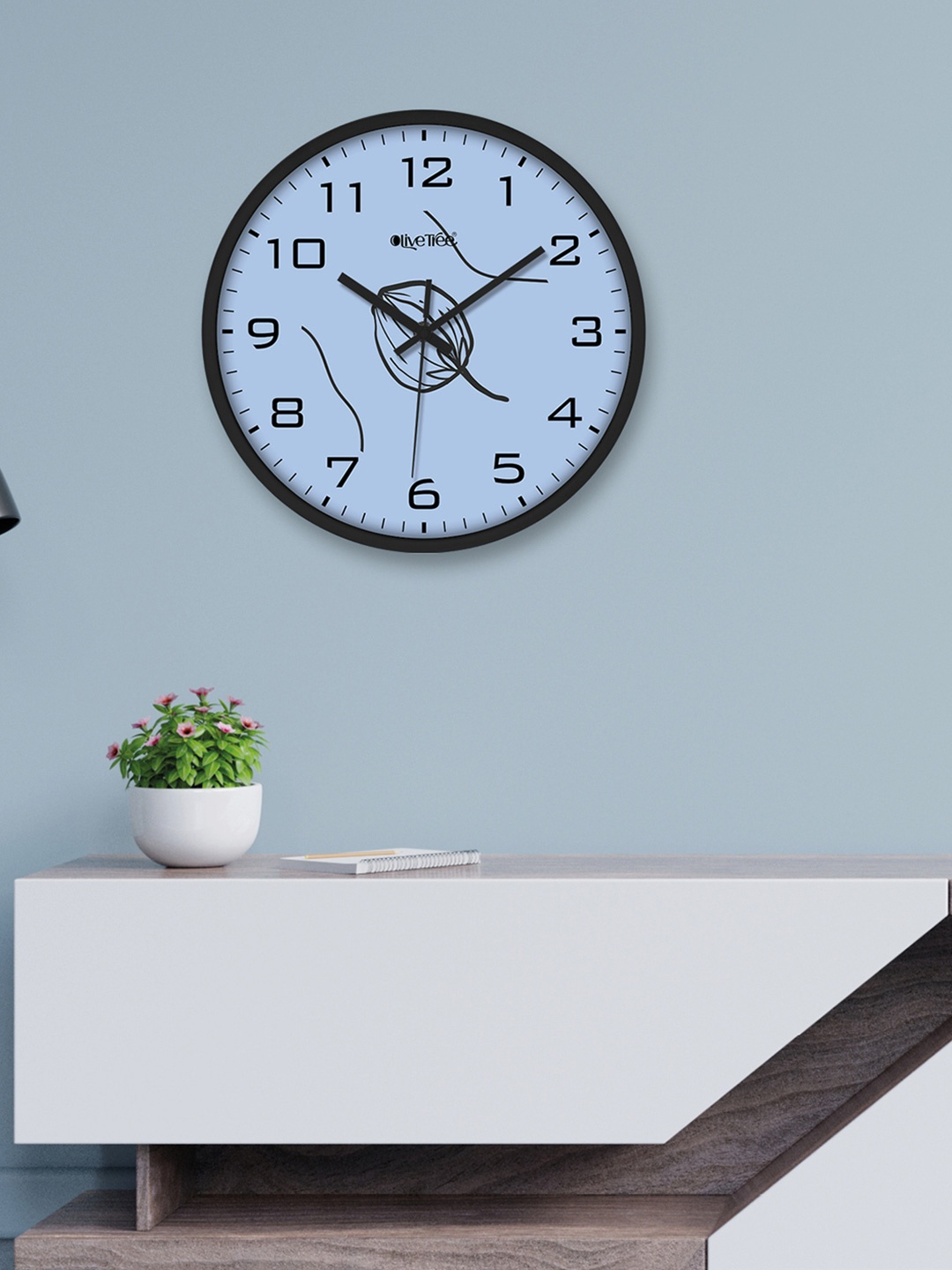 

OLIVE TREE Black & Blue Printed Analogue Contemporary Wall Clock