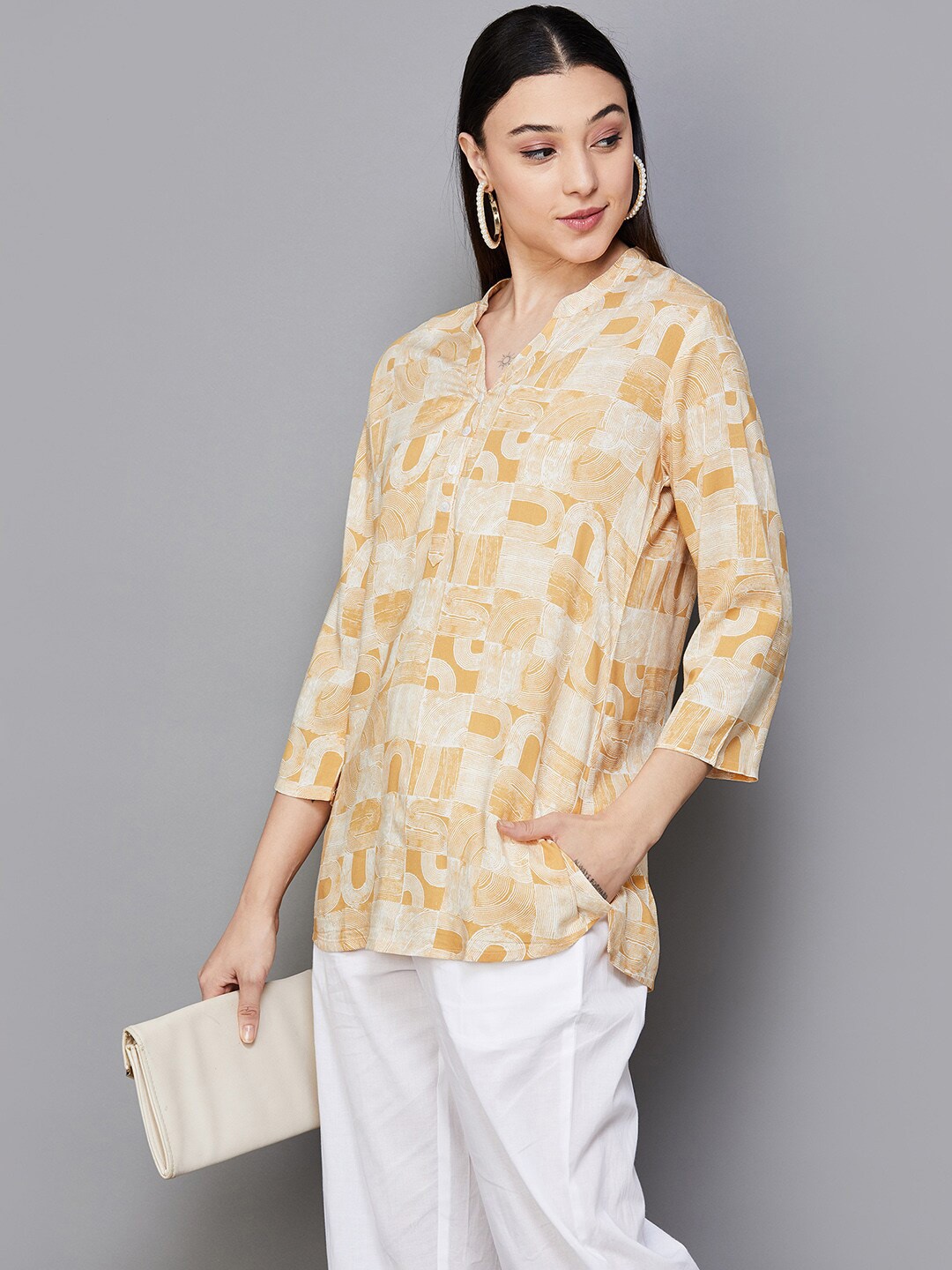 

Melange by Lifestyle Geometric Printed Mandarin Collar Regular Straight Kurti, Yellow