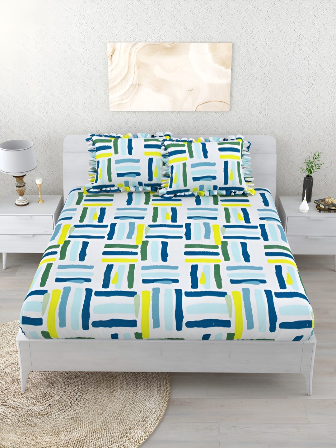 

Aura White & Blue Geometric 260 TC King Bedsheet with 2 Pillow Covers