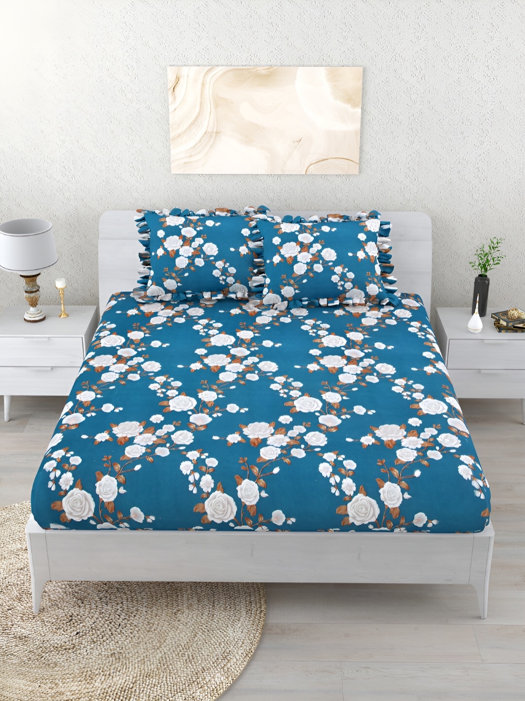 

Aura Blue & White Floral Fitted 260 TC King Bedsheet with 2 Pillow Covers