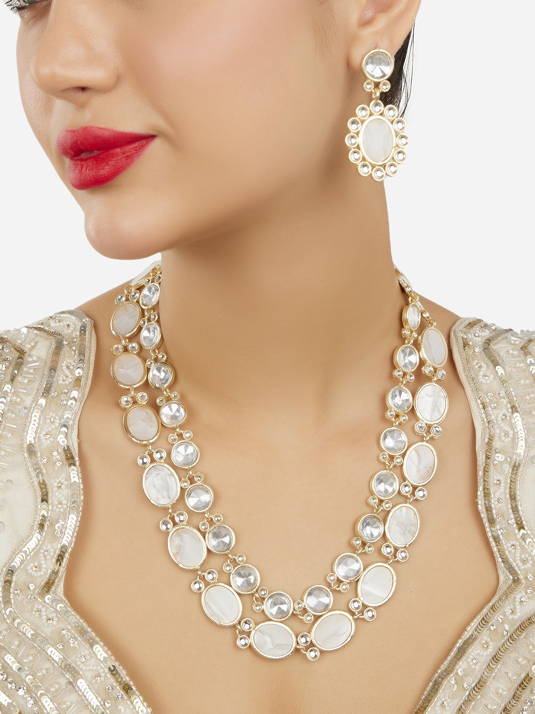 

Zaveri Pearls Gold-Plated Stones Studded Jewellery Set