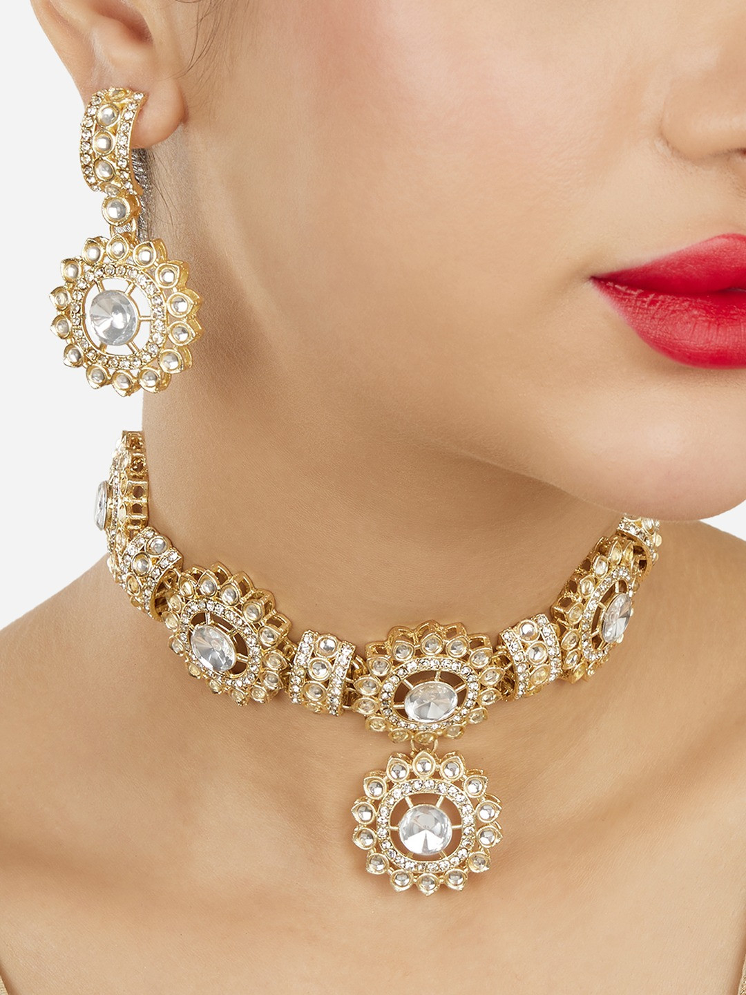 

Zaveri Pearls Gold-Plated Stones Studded Jewellery Set