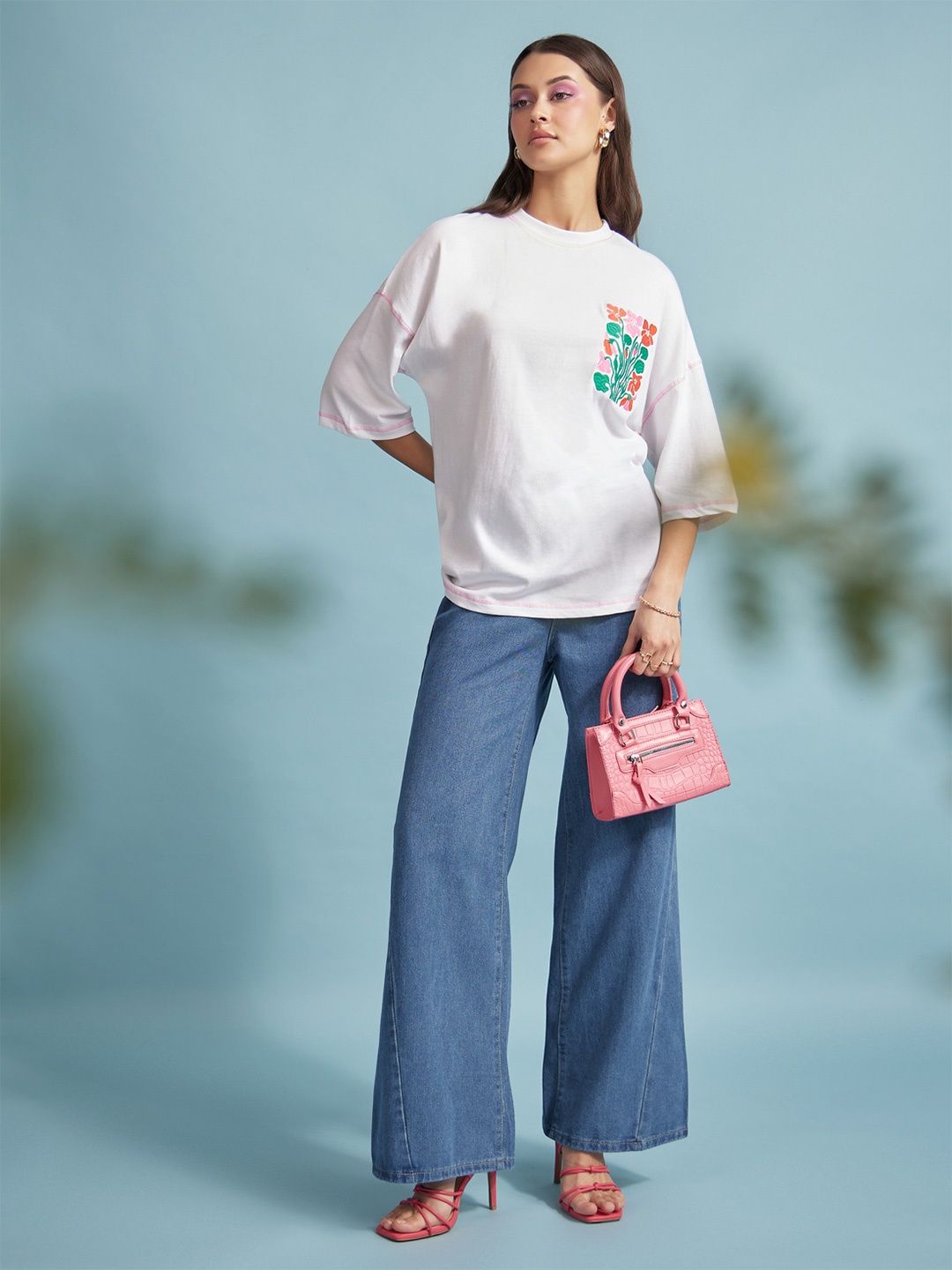 

Styli Women Dropped Shoulder Contrast Graphic Oversized T-Shirt, White