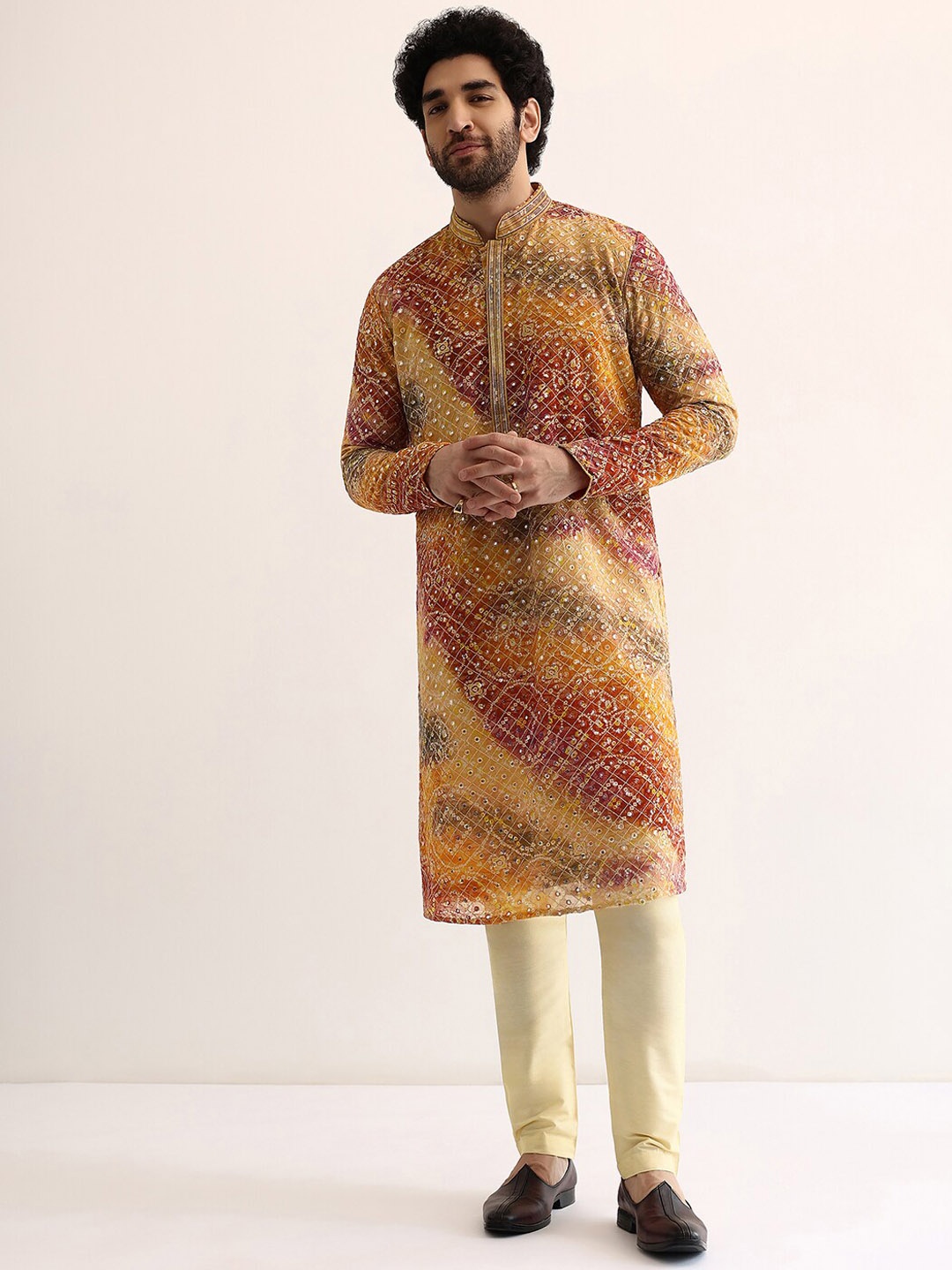 

KALKI Fashion Bandhani Embroidered Regular Mirror Work Kurta with Pyjamas, Peach