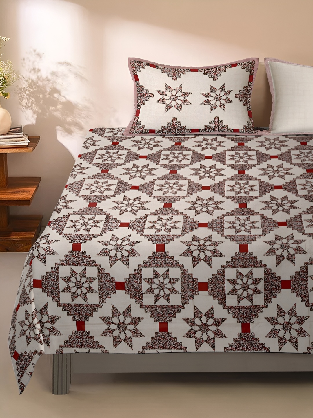 

Rajasthan Decor Beige & Red Floral 210 TC King Bedsheet with 2 Pillow Covers
