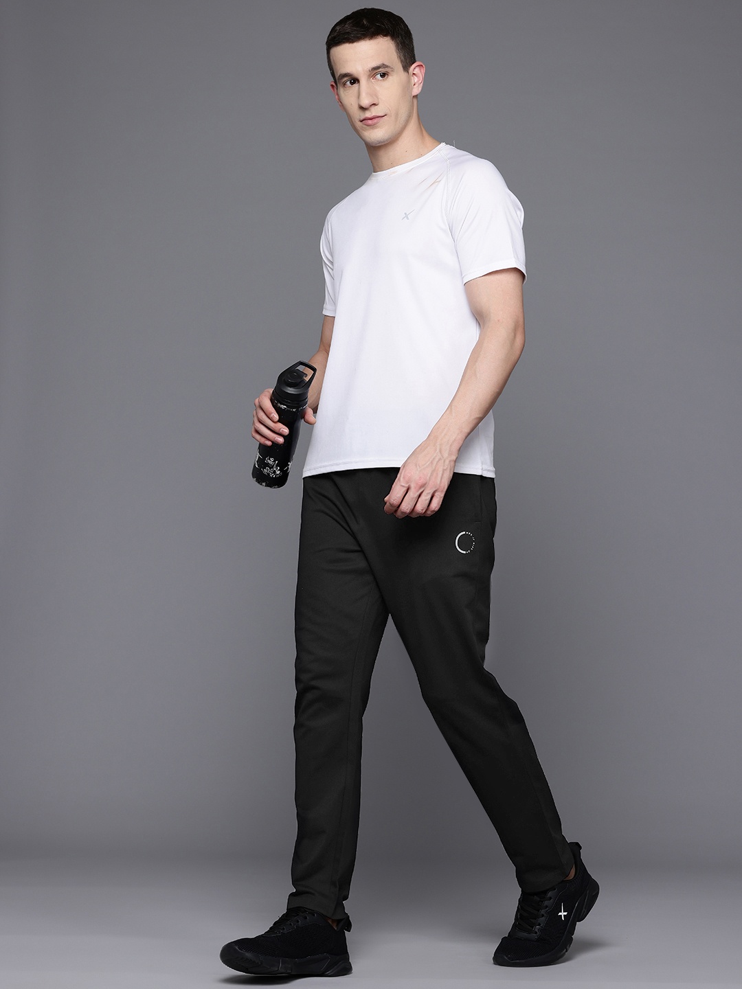 

HRX by Hrithik Roshan Men Solid Regular Fit Track Pants, Black