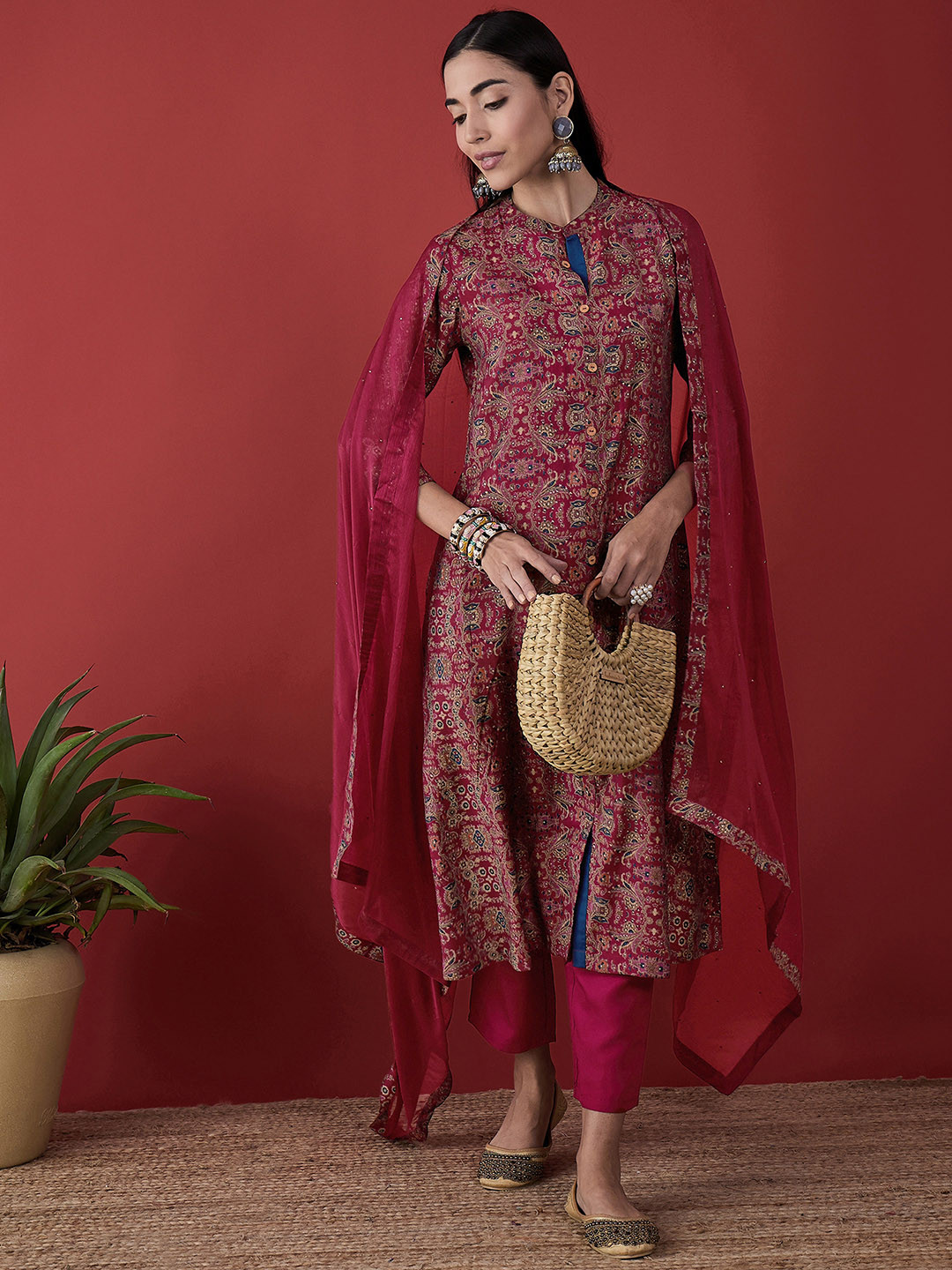 

Anouk Magenta Ethnic Motifs Printed Mandarin Collar Kurta with Trousers & Dupatta