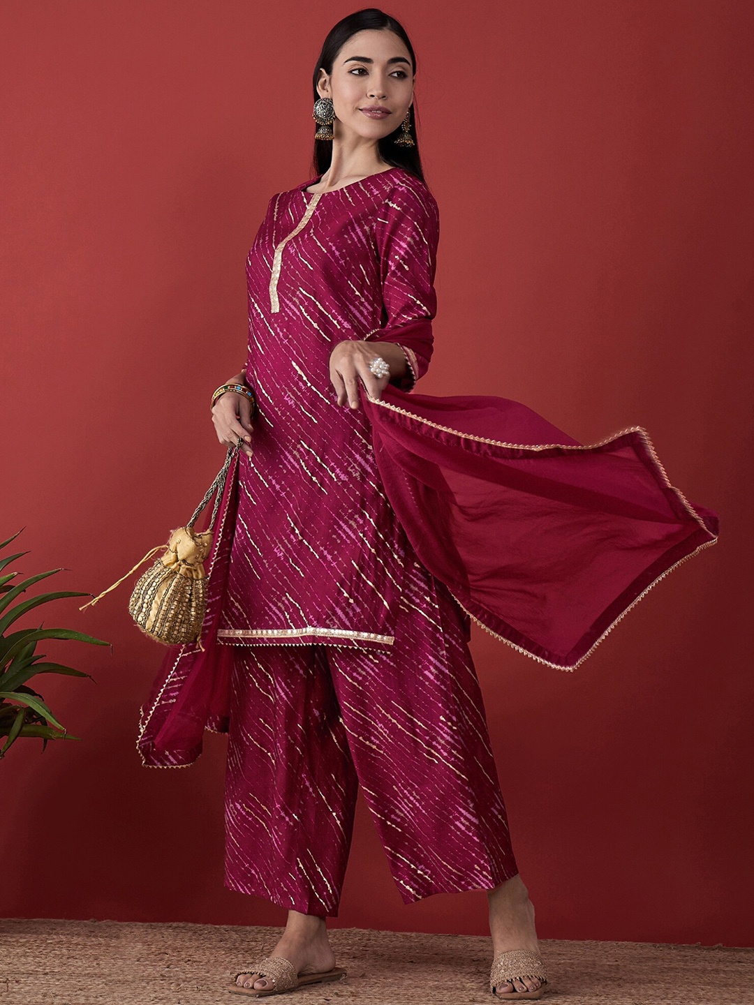 

Anouk Fuchsia Leheriya Printed Round Neck Gotta Patti Kurta with Palazzos & Dupatta