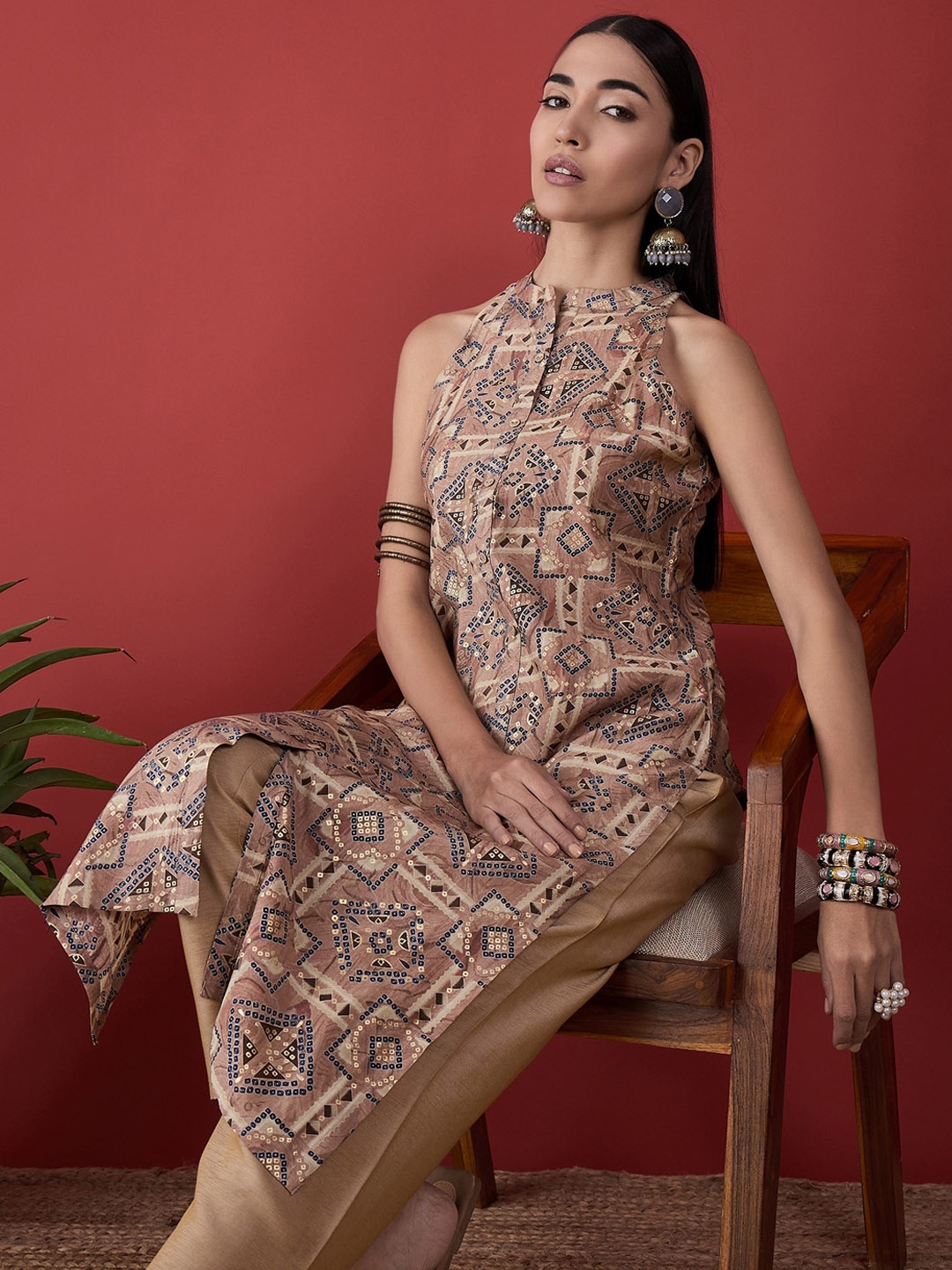 

Anouk Peach Bandhani Printed Mandarin Collar Zari detail A-Line Kurta