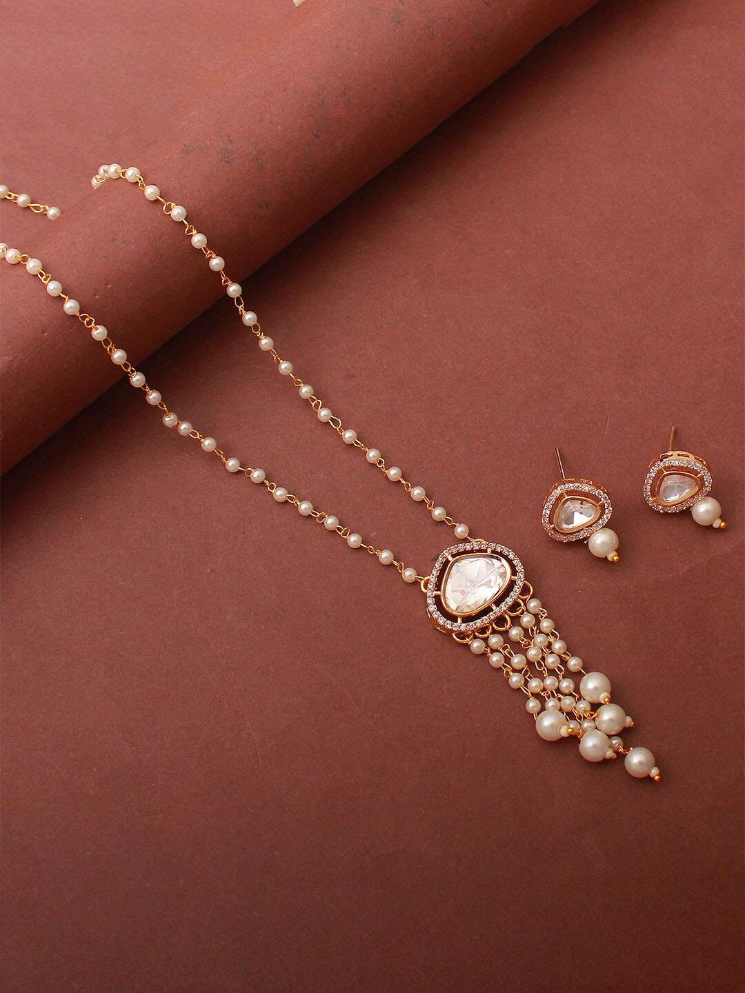 

Mirana Gold Plated Artificial Stones Studded & Beads Beaded Necklace And Earrings, White