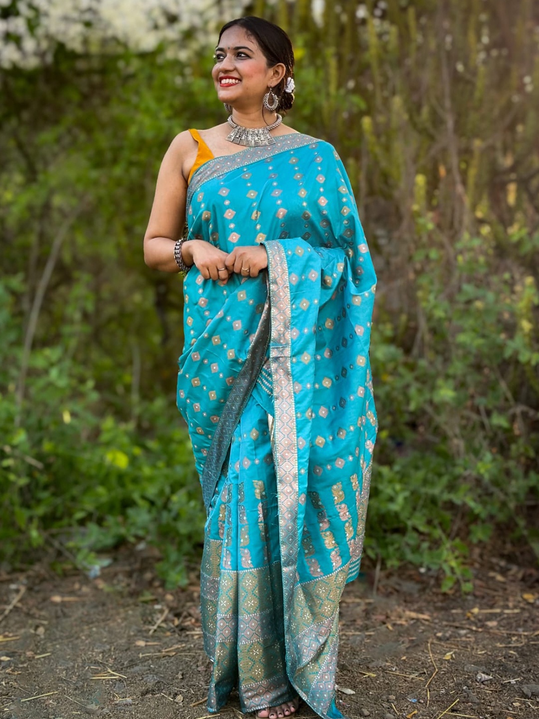 

Apaapi Threads of glory Ethnic Motifs Zari Silk Blend Mekhela Chador Saree, Turquoise blue