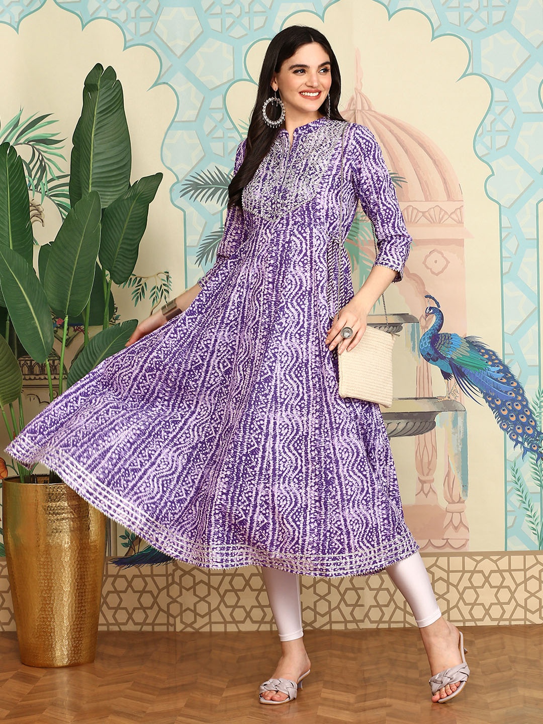 

Ishin Ethnic Motifs Printed Mandarin Collar Sequined A-line Kurta, Lavender