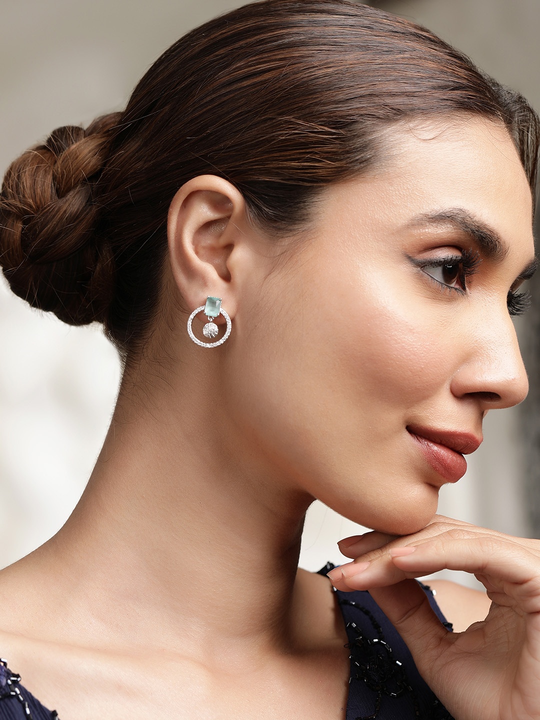 

Rubans Rhodium Plated High Quality Sky Blue Cubic Zirconia Studded Stud Earrings, Silver