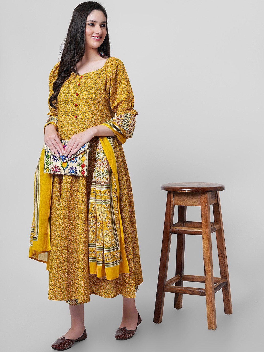 

JANAKDULARI CREATION Floral Printed Gotta Patti Pure Cotton Kurta with Trousers & Dupatta, Mustard