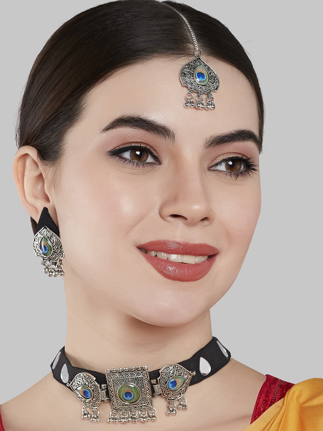 

GRLIE Oxidised Silver-Plated Peacock Trend Choker Set With Maangtika And Earrings