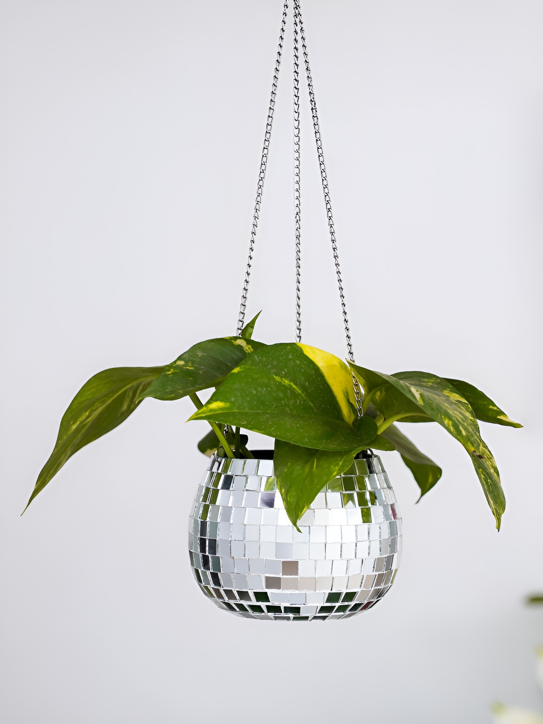 

DecorTwist Silver Toned Textured Metal Planter With Chain