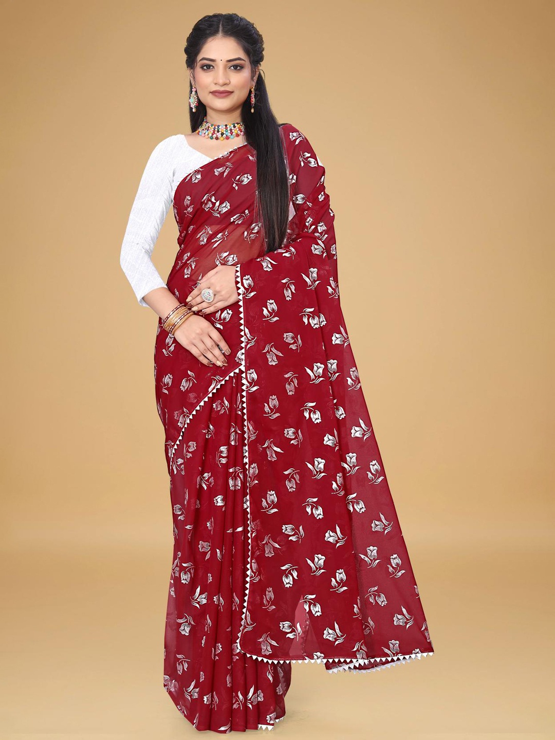 

VRAGI Women Floral Pure Georgette Saree, Maroon