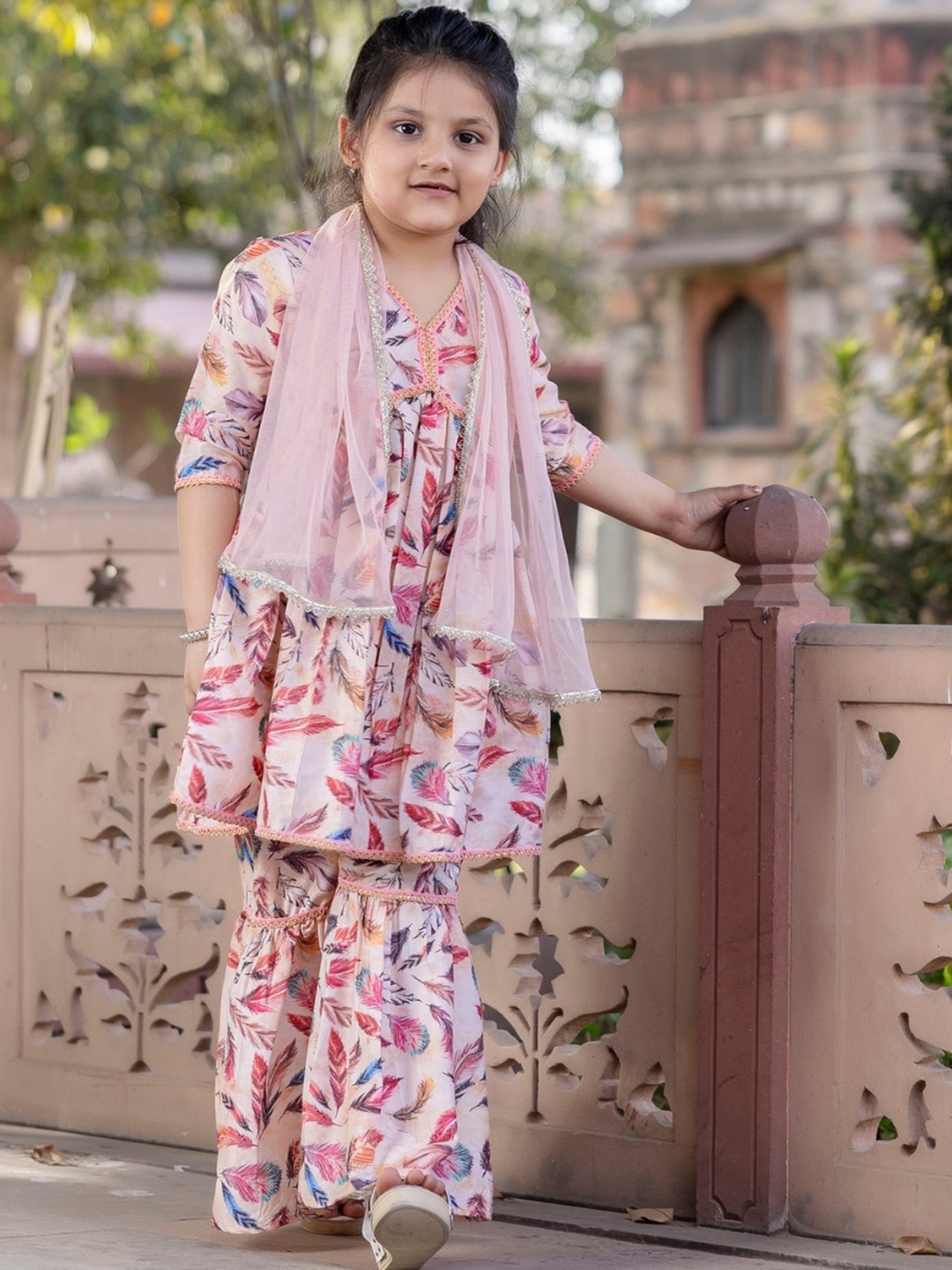 

Cutiediva Girls Ethnic Motifs Printed Anarkali Kurta With Sharara & Dupatta, Peach