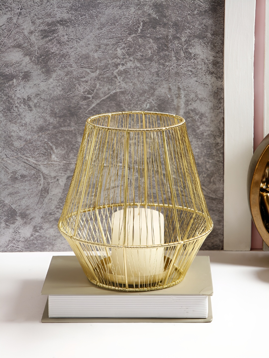 

Aura Gold-Toned Candle Holder