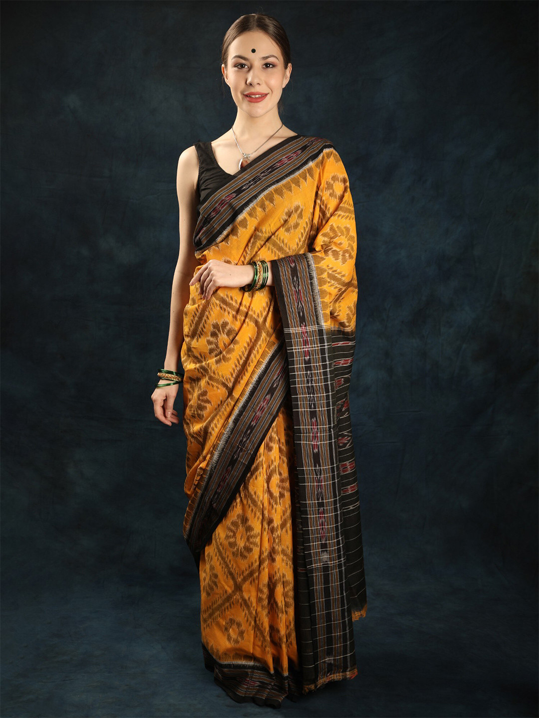 

Exotic India Ethnic Motifs Pure Cotton Ikat Saree, Yellow