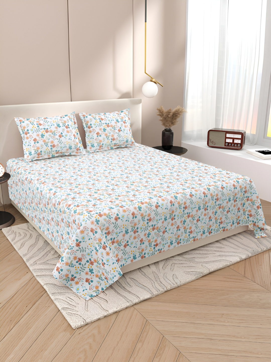 

Aura White & Orange Floral Cotton 220 TC King Bedsheet With 2 Pillow Covers