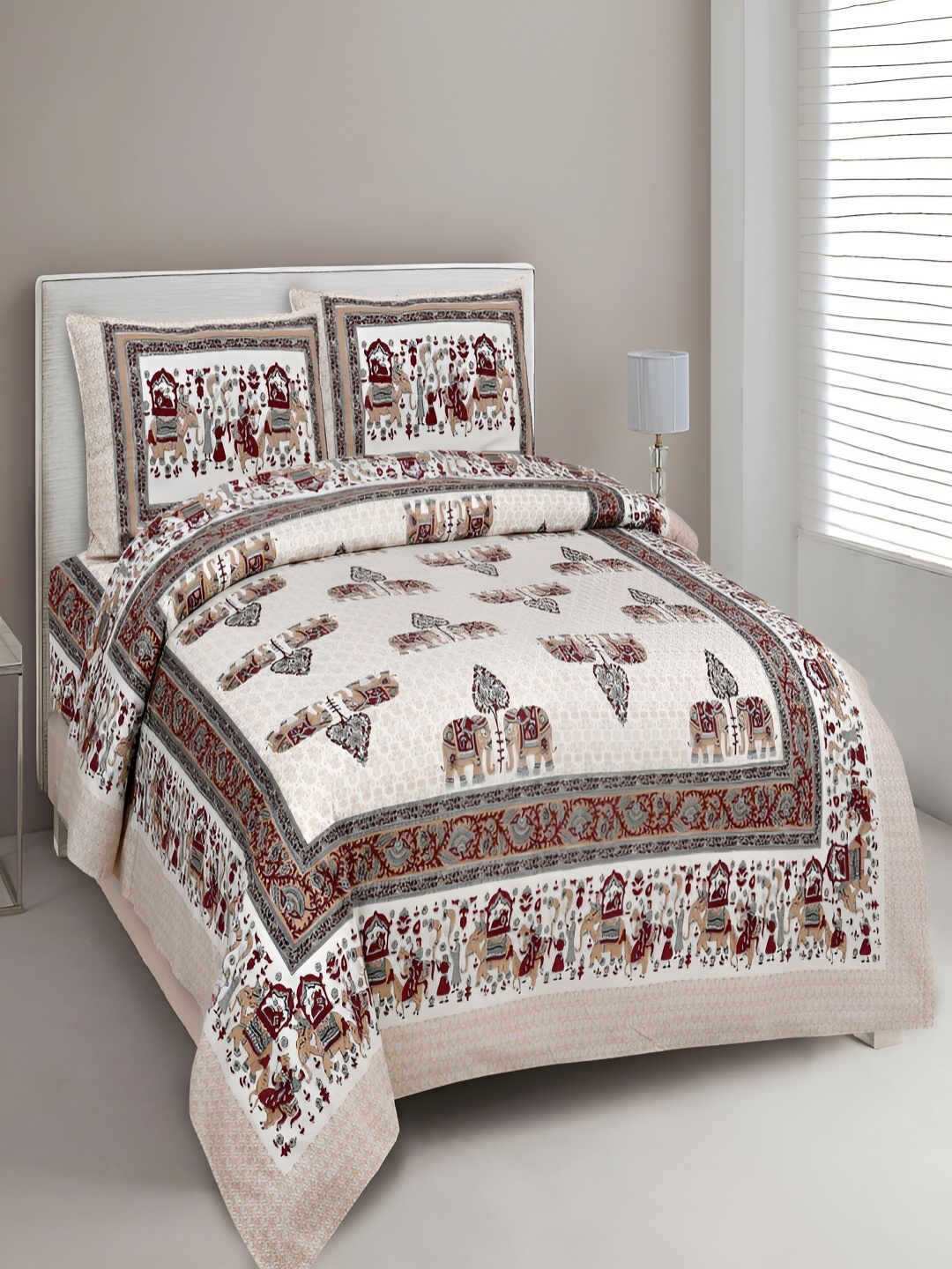 

Aura Maroon & White Ethnic Motifs 180 TC Cotton King Bedsheet With 2 Pillow Covers