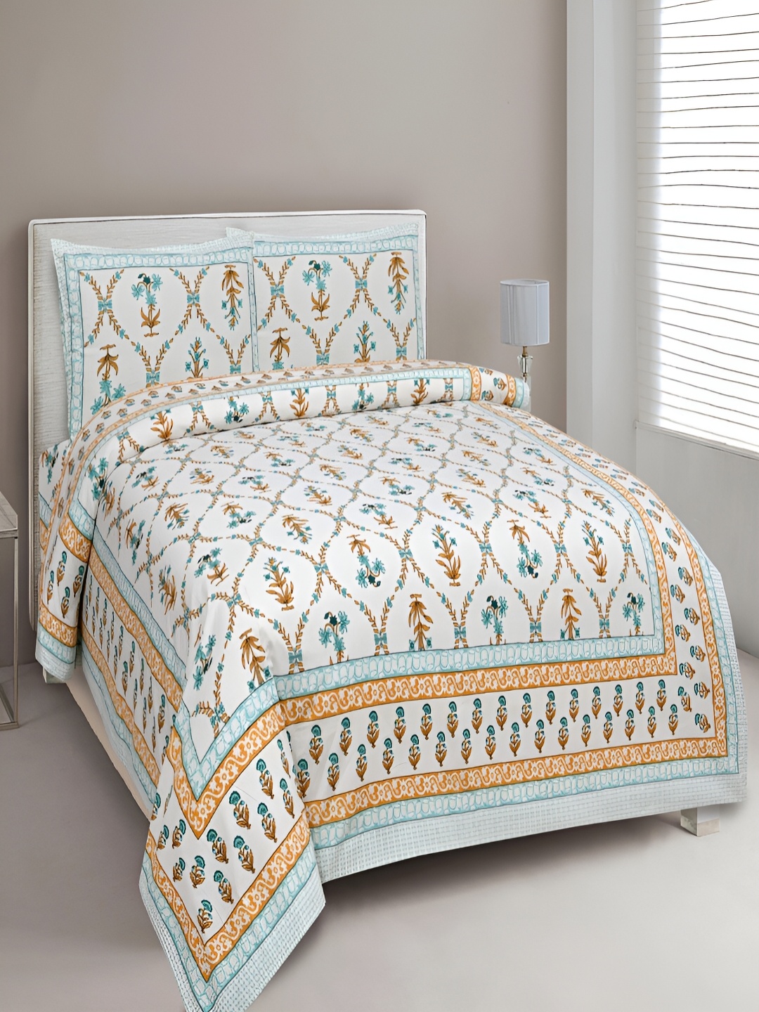 

Aura Turquoise Blue & White Ethnic Motifs Cotton 180 TC King Bedsheet with 2 Pillow Covers
