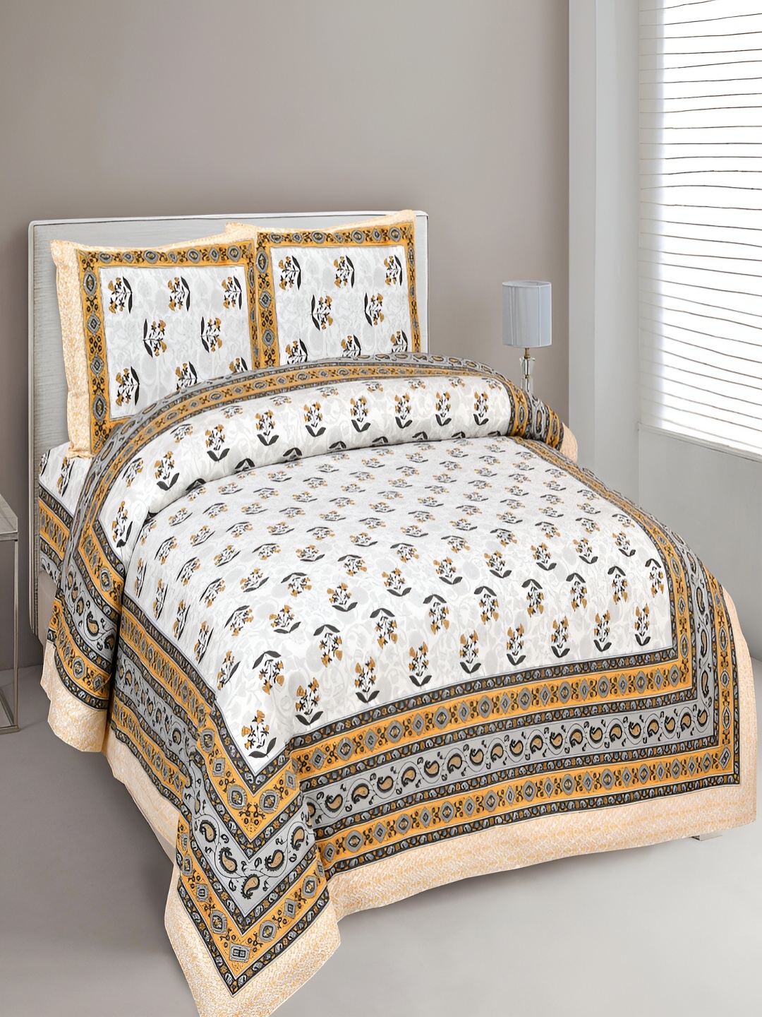 

Aura Yellow & White Floral Cotton 180 TC King Bedsheet with 2 Pillow Covers