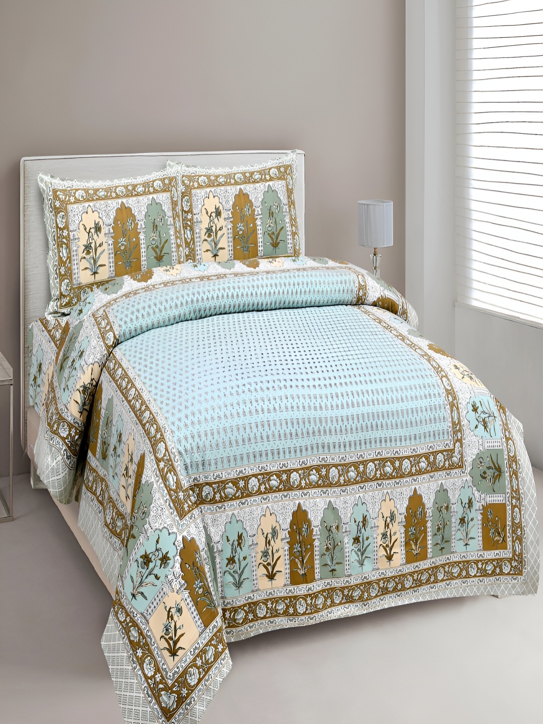 

Aura Turquoise Blue Ethnic Motifs Printed Cotton 180 TC King Bedsheet with 2 Pillow Covers