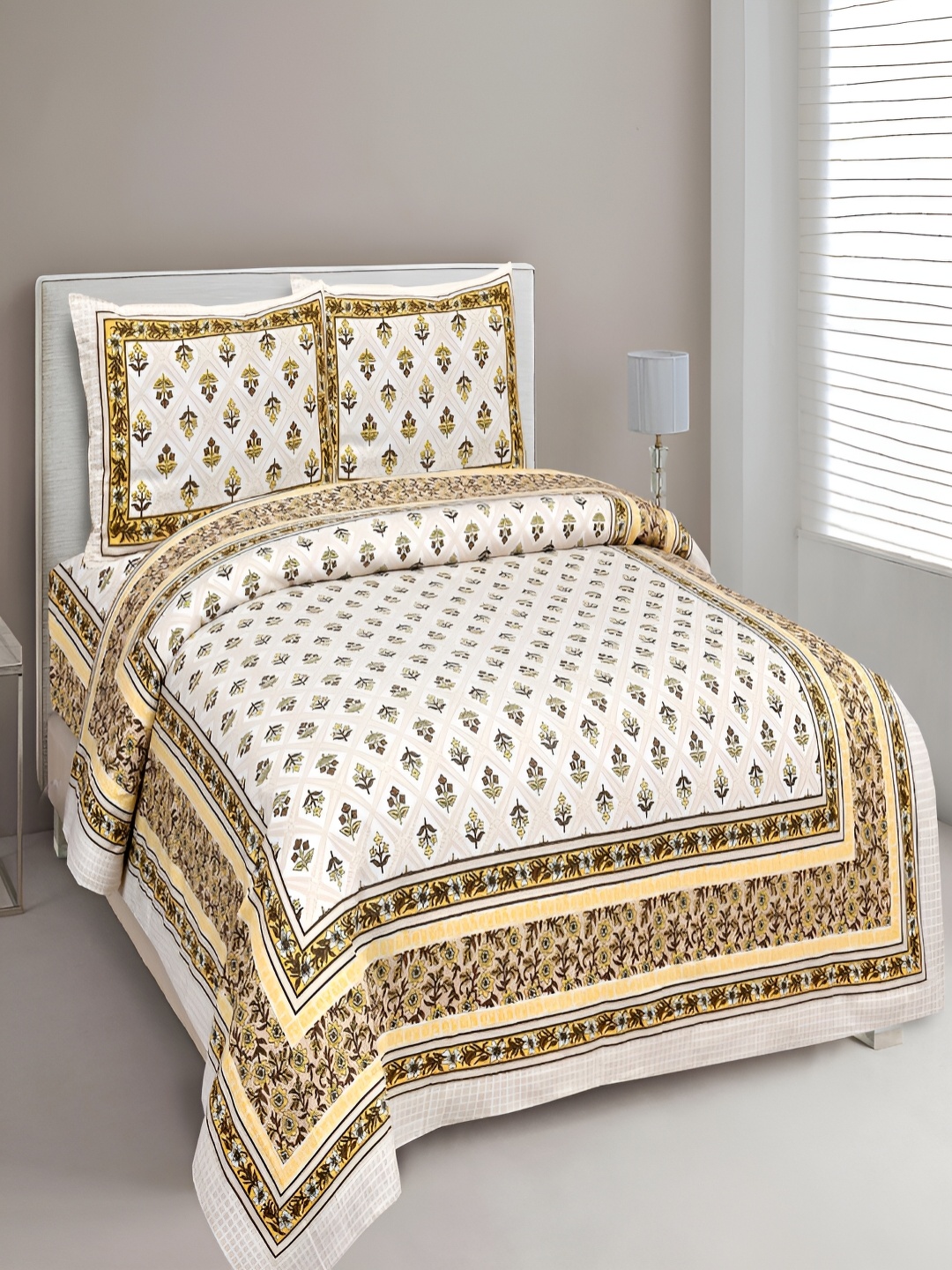 

Aura Yellow & White Floral Cotton 180 TC King Bedsheet with 2 Pillow Covers
