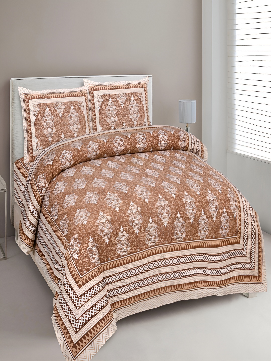 

Aura Brown & White Ethnic Motifs 180 TC Cotton King Bedsheet With 2 Pillow Covers