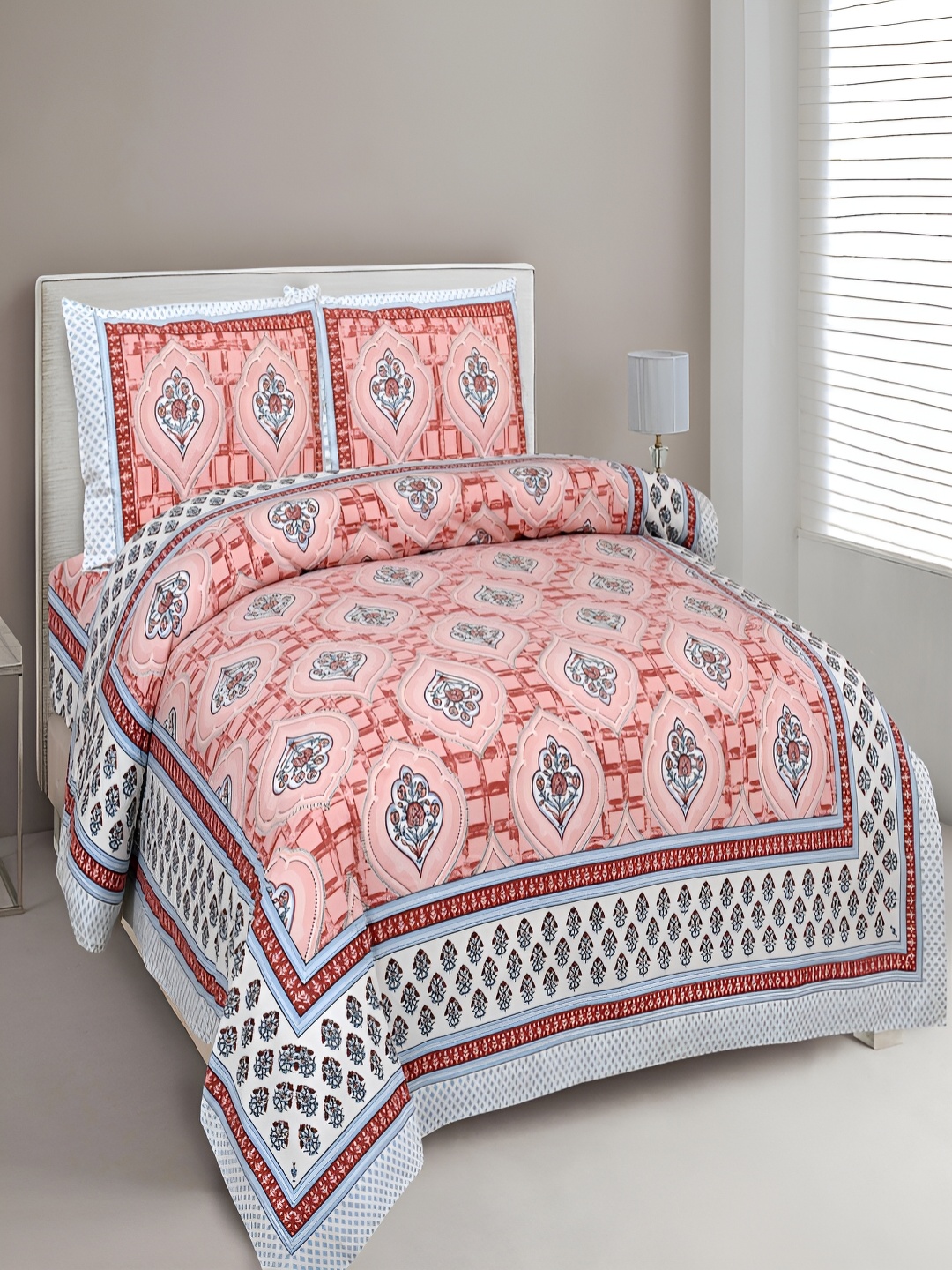 

Aura Peach-Coloured & White Ethnic Motifs 180 TC Cotton King Bedsheet With 2 Pillow Covers