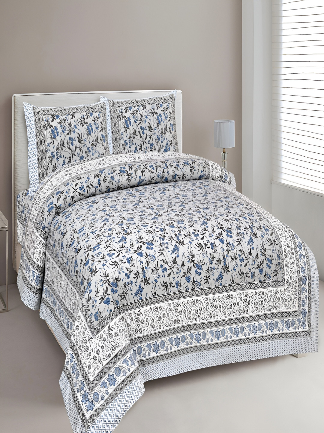 

Aura Blue & White Floral 180 TC King Bedsheet with 2 Pillow Covers
