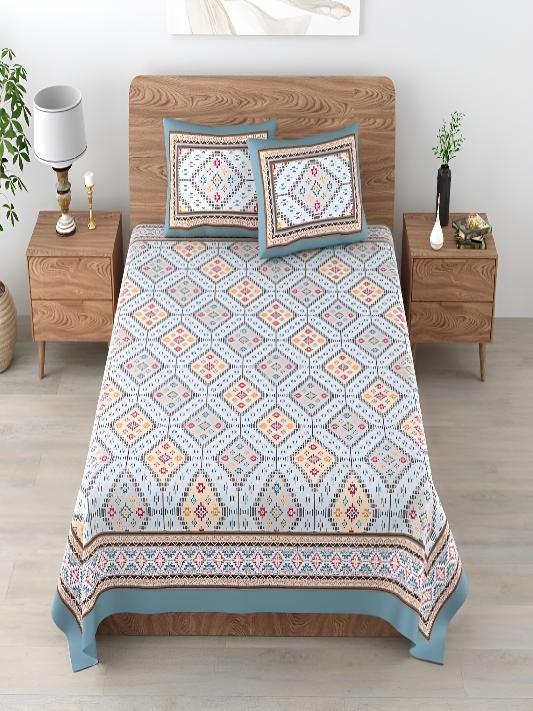 

Aura Blue & Yellow Ethnic Motifs 180 TC Cotton King Bedsheet With 2 Pillow Covers
