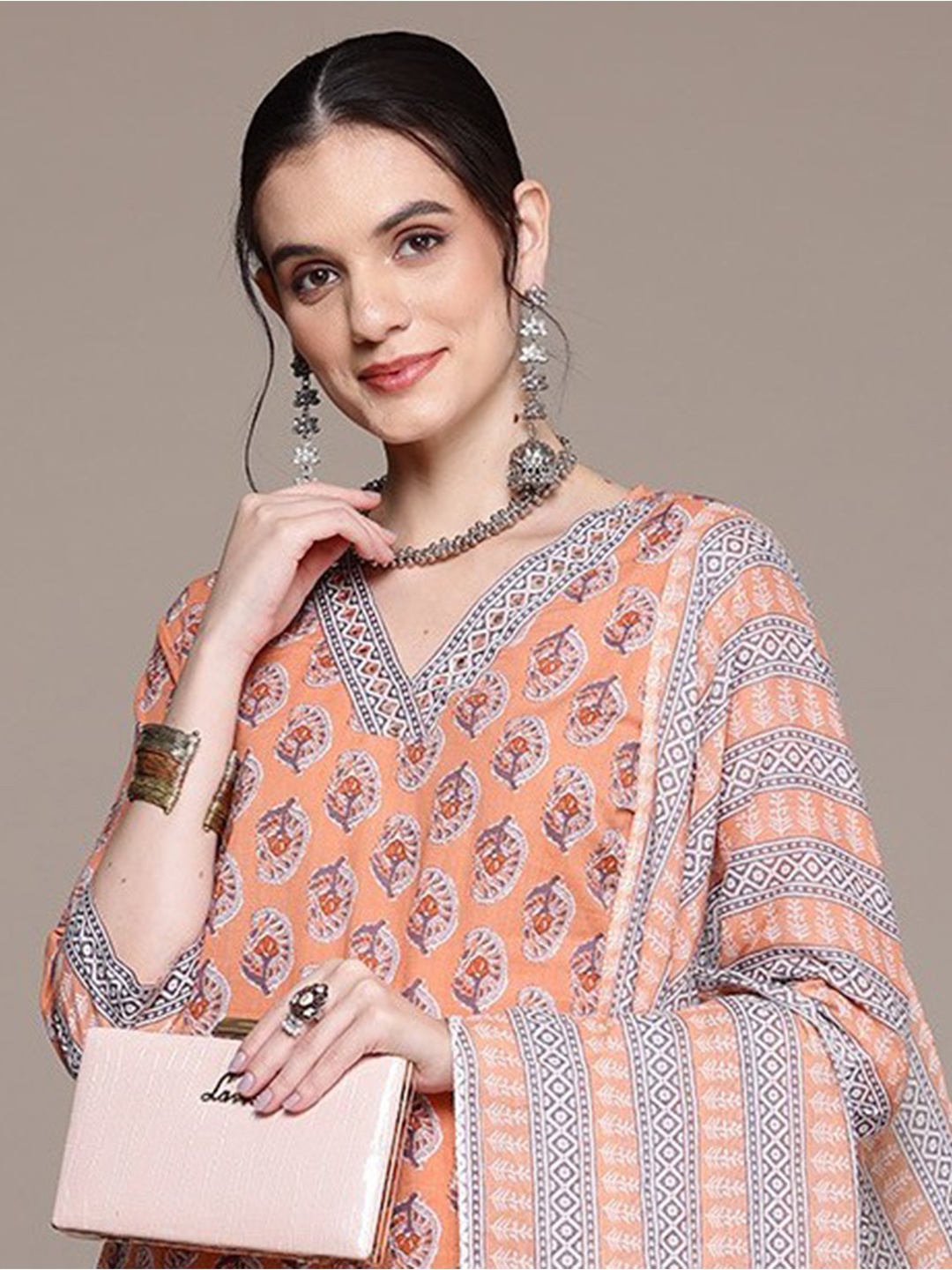 

Readiprint Women Ethnic Motifs Mirror Work Kurta with Trousers & With Dupatta, Peach